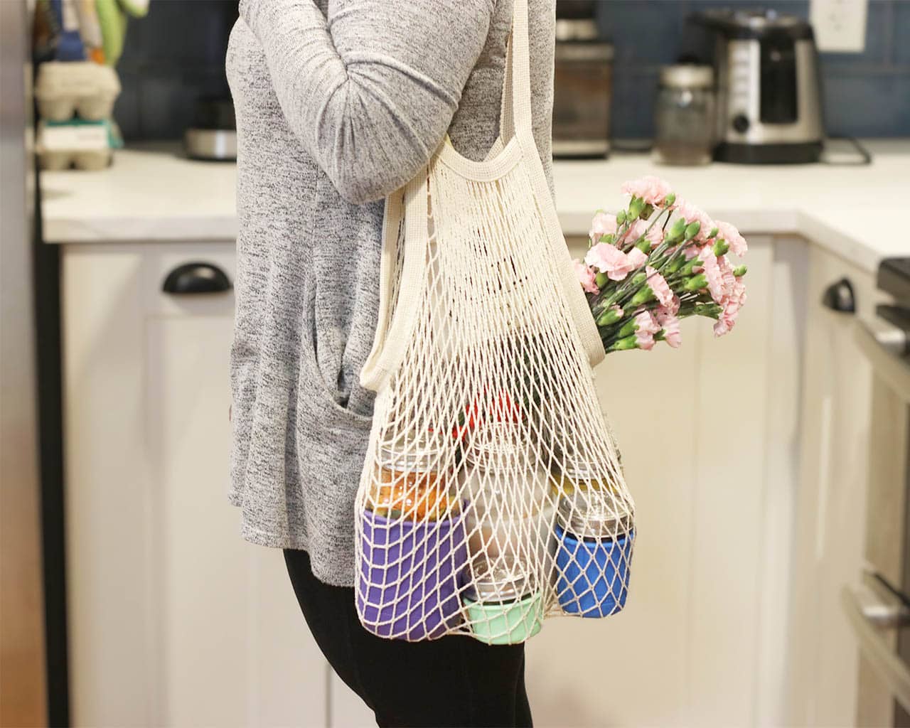 Organic cotton string tote bag with front pocket from Mason Jar Lifestyle, casual carryall with natural woven design.