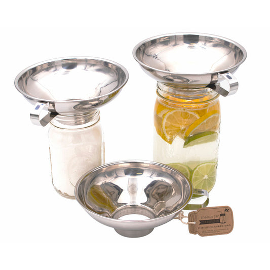 Three Mason Jar Lifestyle Stainless Steel Canning Funnels for Mason Jars—two atop jars filled with sugar and lemon-lime water, one in front, and a brown tag on the side.