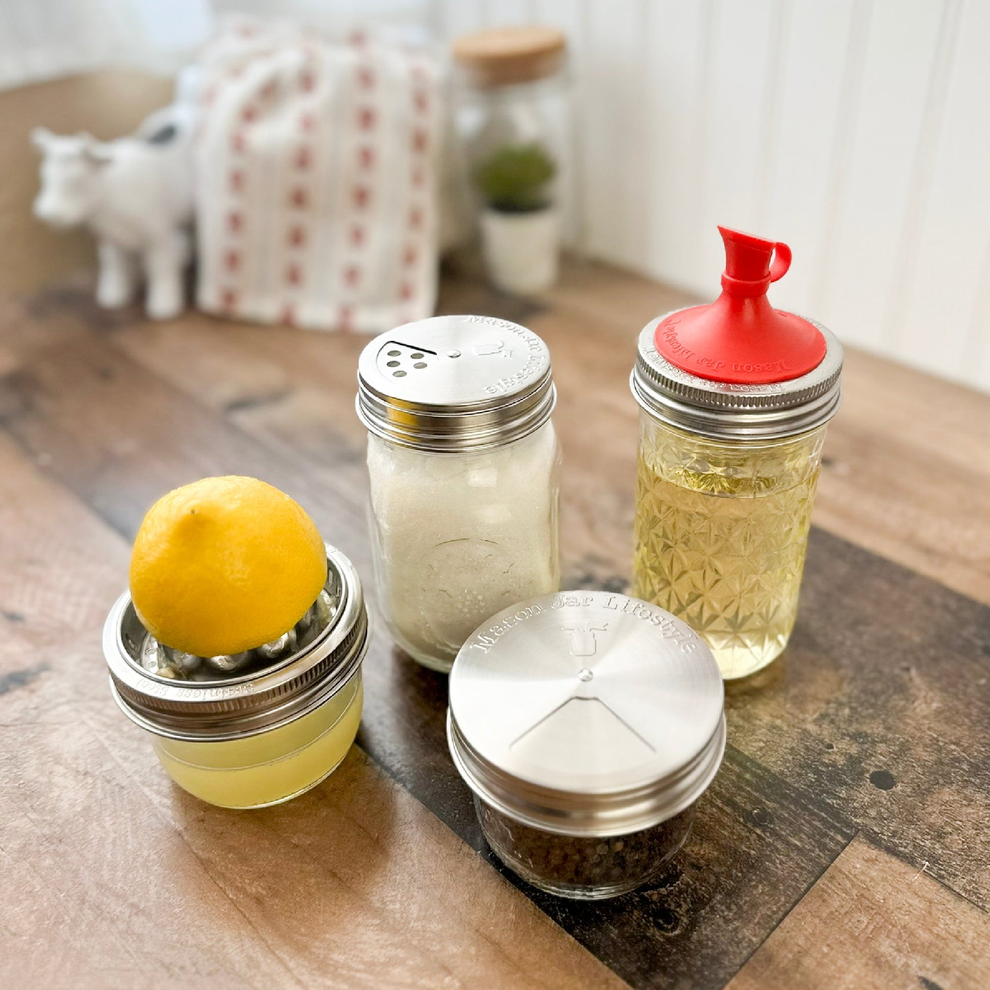 Set of four stainless steel spice shaker lids for mason jars, compatible with regular-mouth Mason Jars, from Mason Jar Lifestyle.