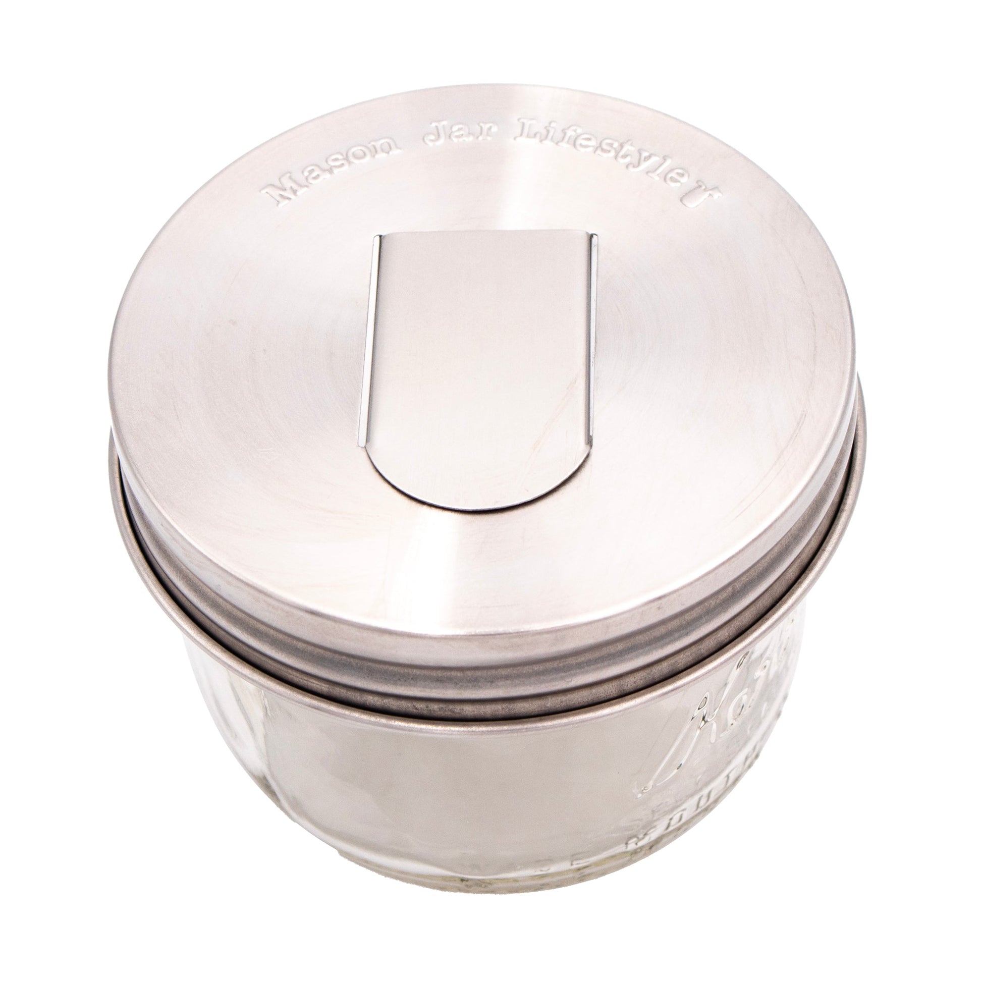Two stainless steel lids with grain dispensers for regular-mouth Mason jars, designed for Mason Jar Lifestyle storage.