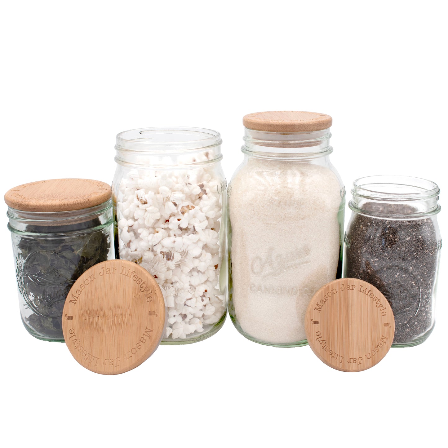 Set of Mason Jar Lifestyle bamboo storage stopper lids for regular-mouth mason jars, featuring natural wood finish and logo details.