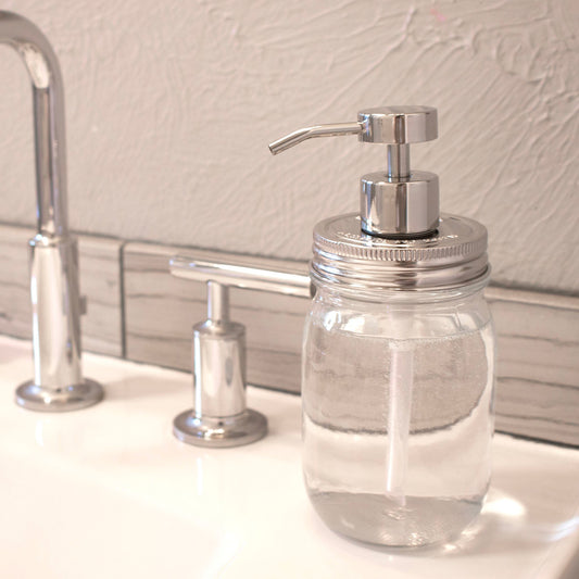 Chrome soap pump dispenser with mirror finish attached to a Mason Jar Lifestyle regular mouth mason jar for soap or lotion.