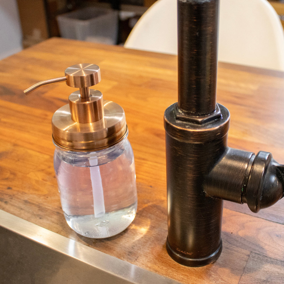 Vintage copper soap pump lid kit for regular mouth mason jars, featuring classic threaded design for bathroom and kitchen use.