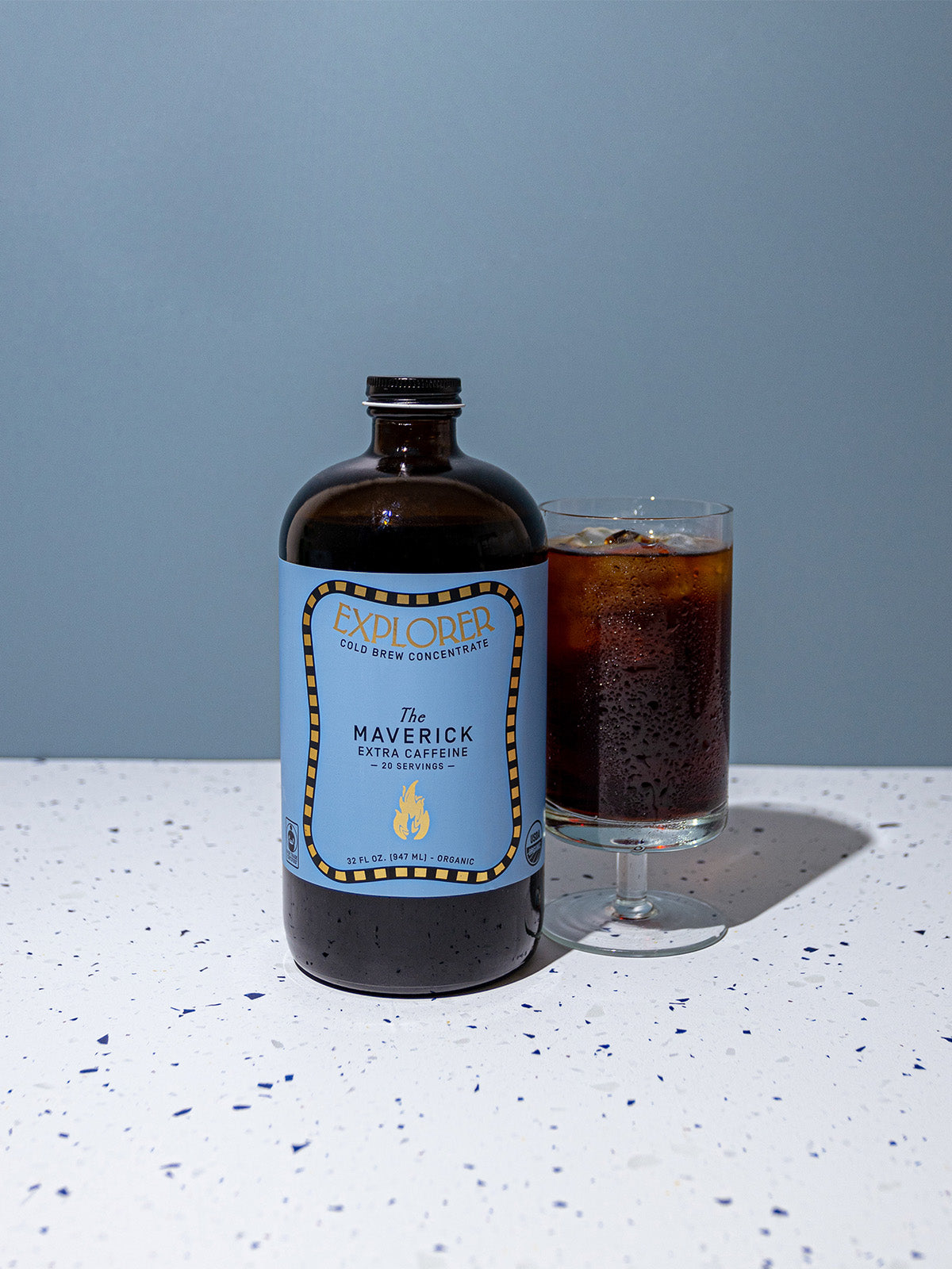 Explorer Cold Brew 32oz coffee cold brew concentrate in a clear bottle with black cap and Maverick branding visible.