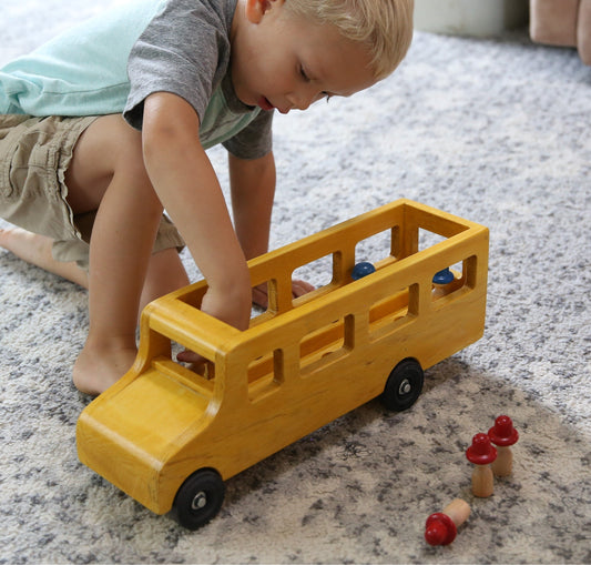 Amish-made wooden school bus toy with child-safe finish, part of wooden trains, trucks, and toys collection by AmishToyBox.com.