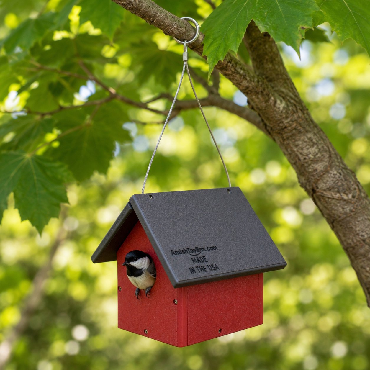 Amish-made poly lumber bird house for chickadees or wrens, featuring a natural wood finish and small entry hole for backyard birds.