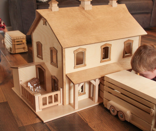 Hand-crafted Pennsylvania Bank Barn toy from AmishToyBox.com, featuring detailed wooden construction and rustic design.