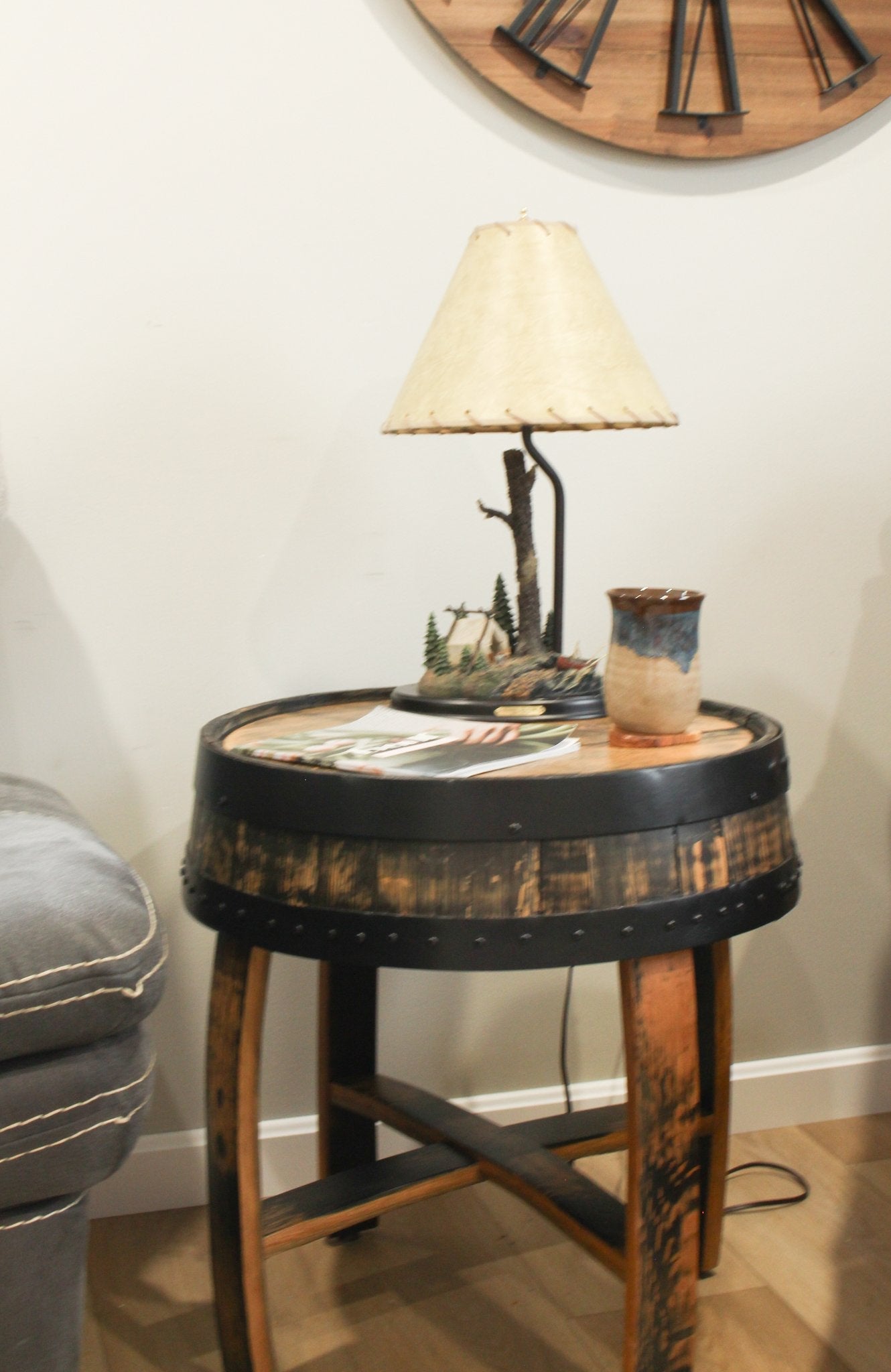 Amish-made rustic end table crafted from reclaimed whiskey barrel with barrel ring accents, featuring a natural wood finish.