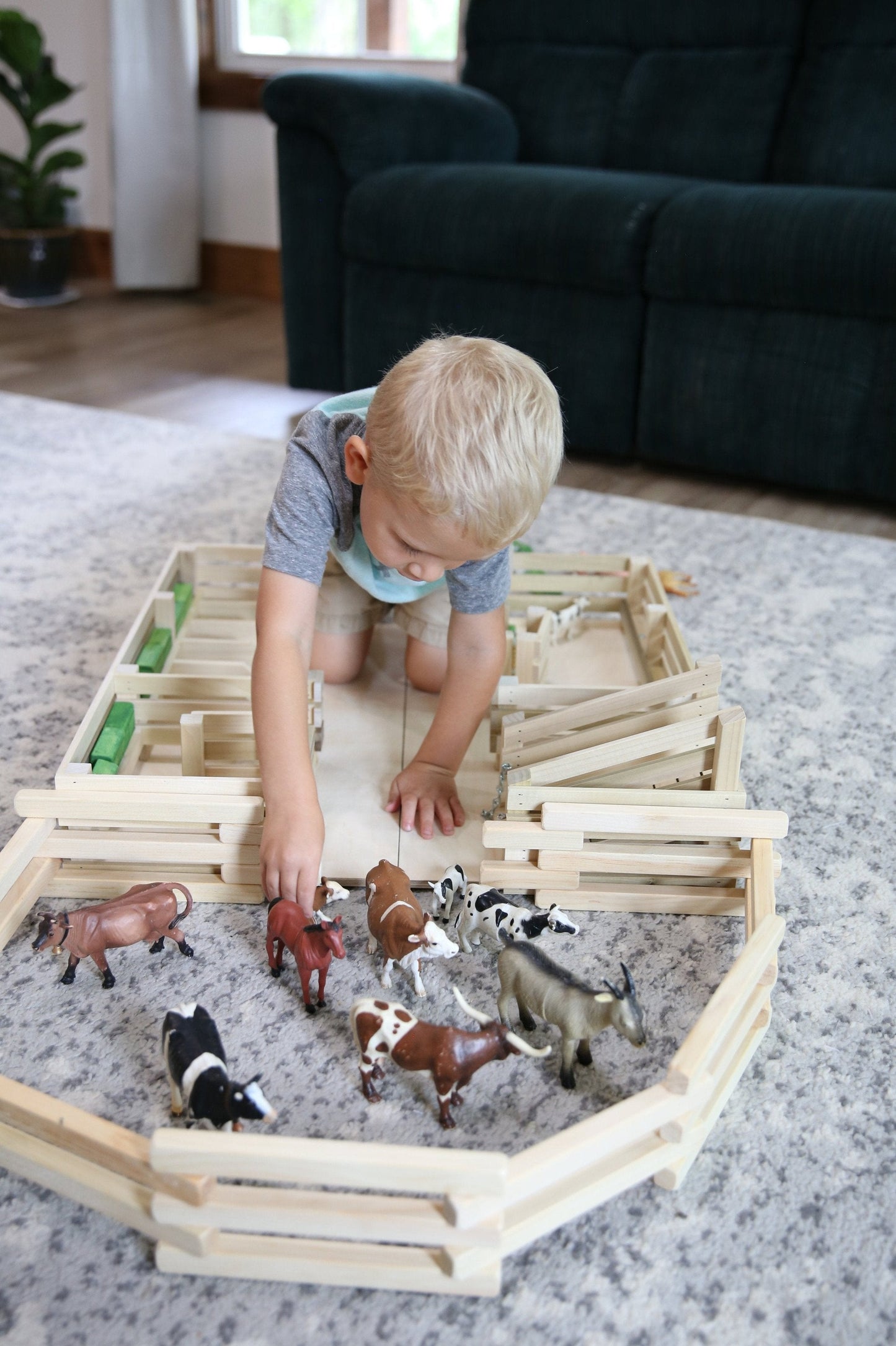 Wooden folding corral fence toy, 68 inches long, Amish-made toy with natural wood finish, suitable for children’s play and imaginative activities.