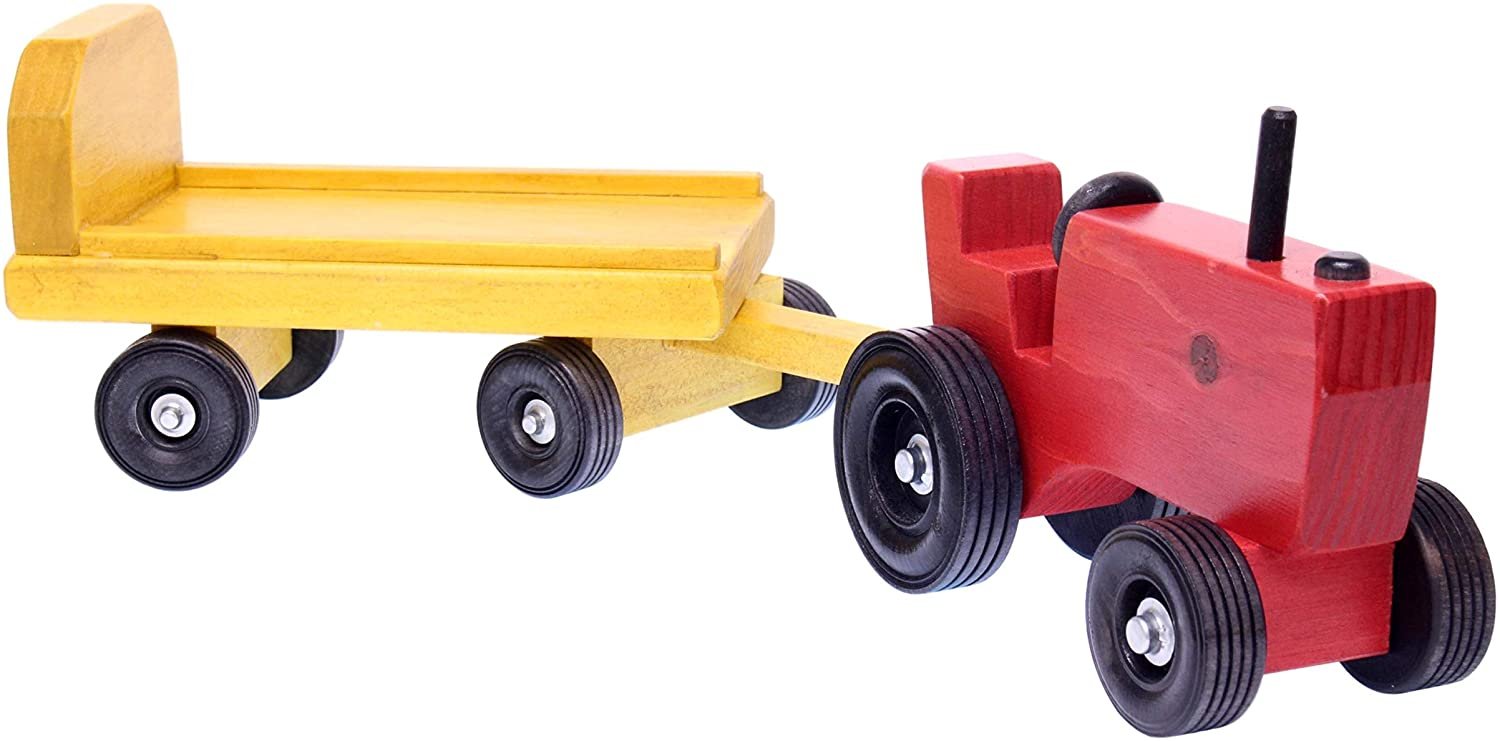 Amish-made wooden toy tractor and wagon set with hay bales, featuring detailed craftsmanship and rustic farm toy design.