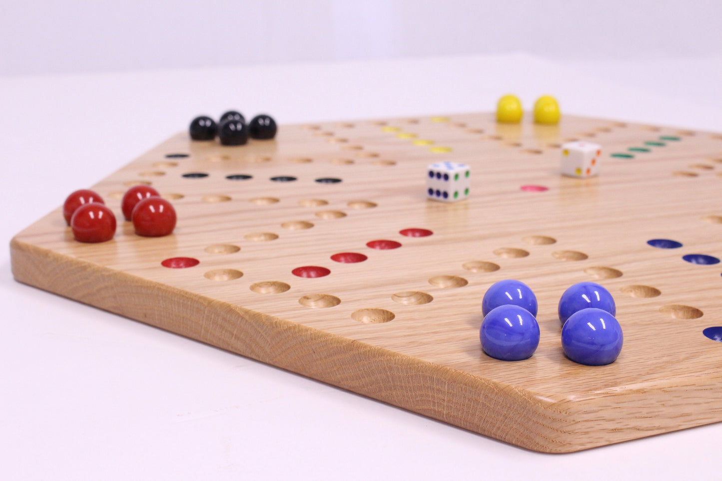 Hand-painted Aggravation Wahoo marble board game on wooden double-sided game board, ideal for family fun and classic wooden toys.
