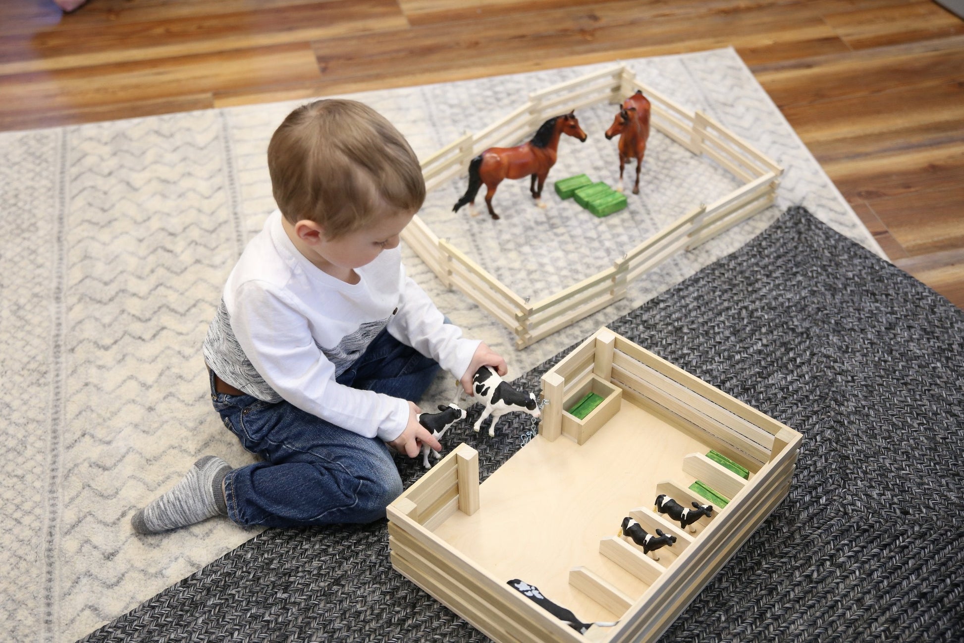 Amish-made wooden mini stockyard toy with seven stalls, ideal for farming play and wooden toy collection.