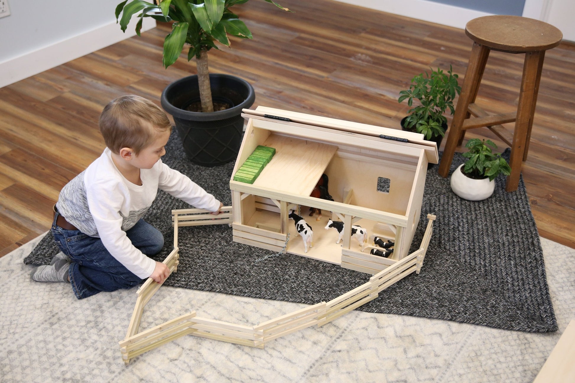 Large wooden A-frame barn toy with hay loft, realistic farm playset by AmishToyBox.com, perfect for imaginative farming fun.