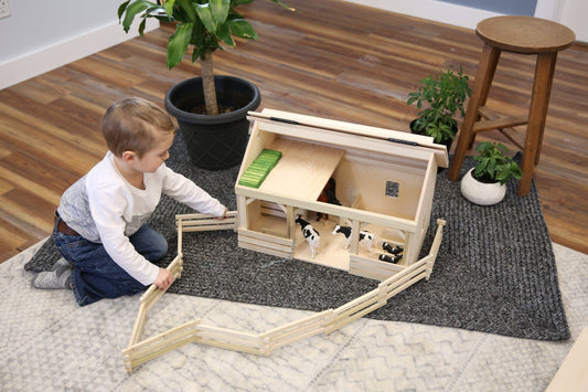 Large wooden A-frame barn toy with hay loft, realistic farm playset by AmishToyBox.com, perfect for imaginative farming fun.