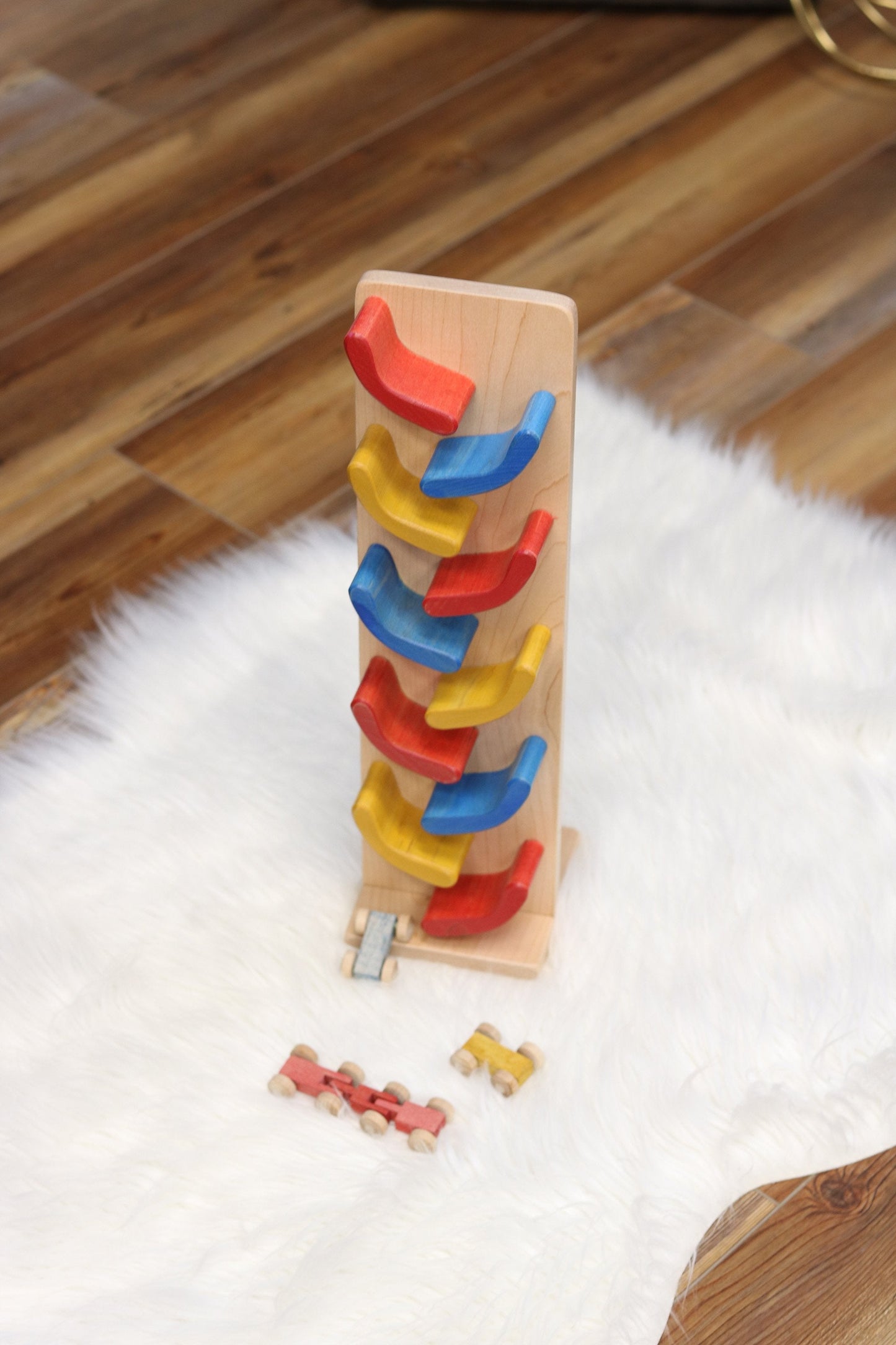 Amish-made mini wooden car roller toy with colorful miniature cars included, perfect for children’s imaginative play.