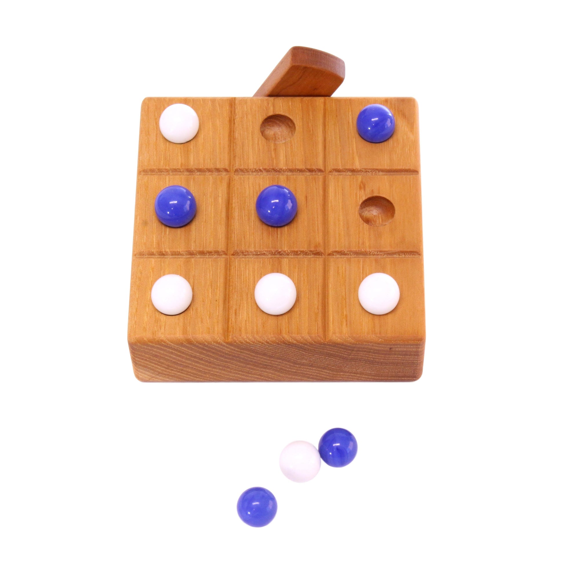 Wooden Marble Tic Tac Toe game with built-in storage for marbles, crafted from wood by AmishToyBox.com.