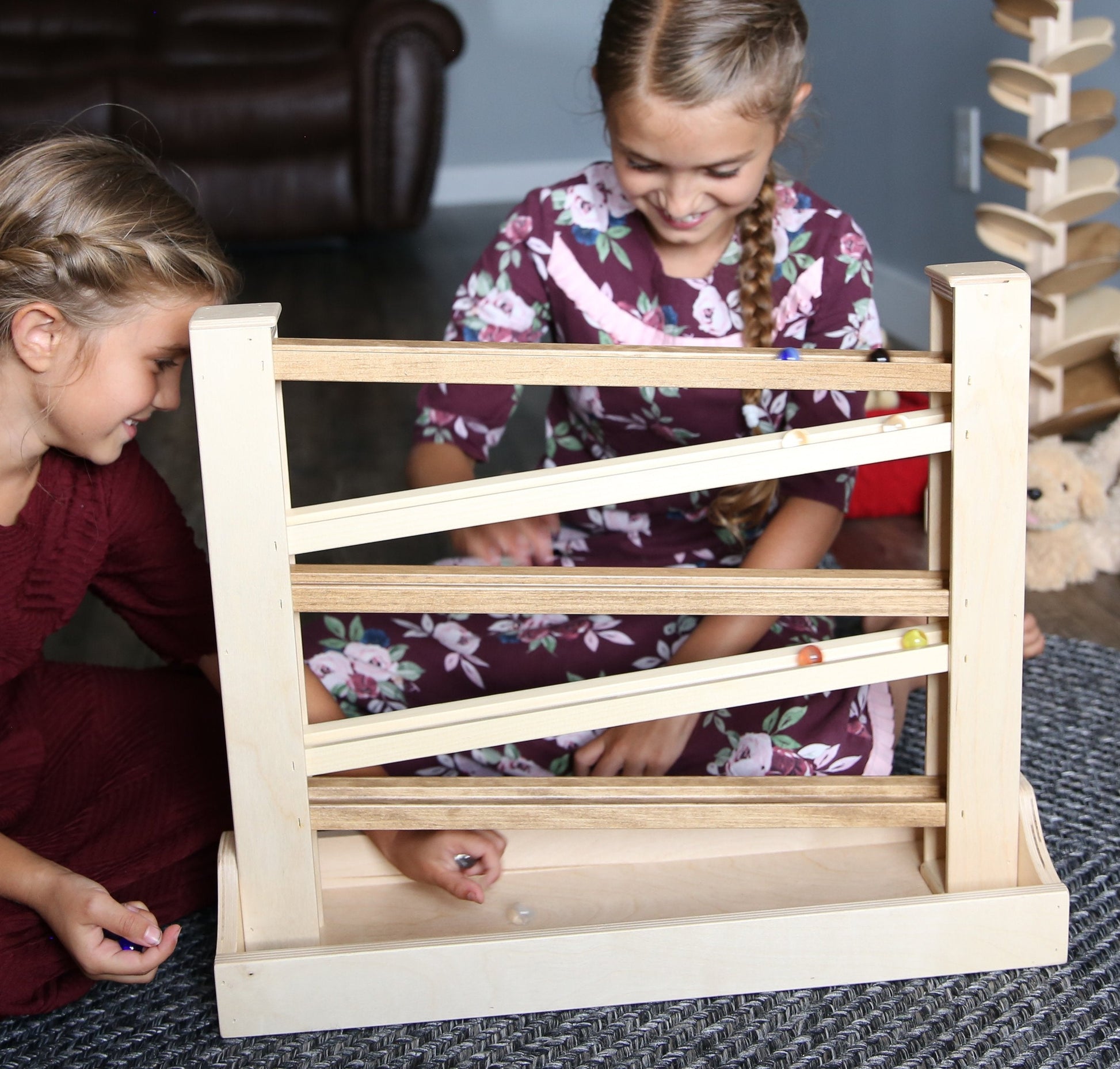 Amish-made heirloom marble and ball roller toy with wooden construction and child-safe finish, perfect for early play and sensory development.