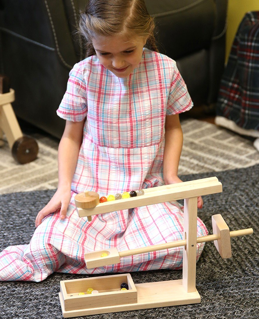 Amish-made wooden marble roller toy with child-safe maple and walnut finish, featuring colorful marbles and ball rollers.