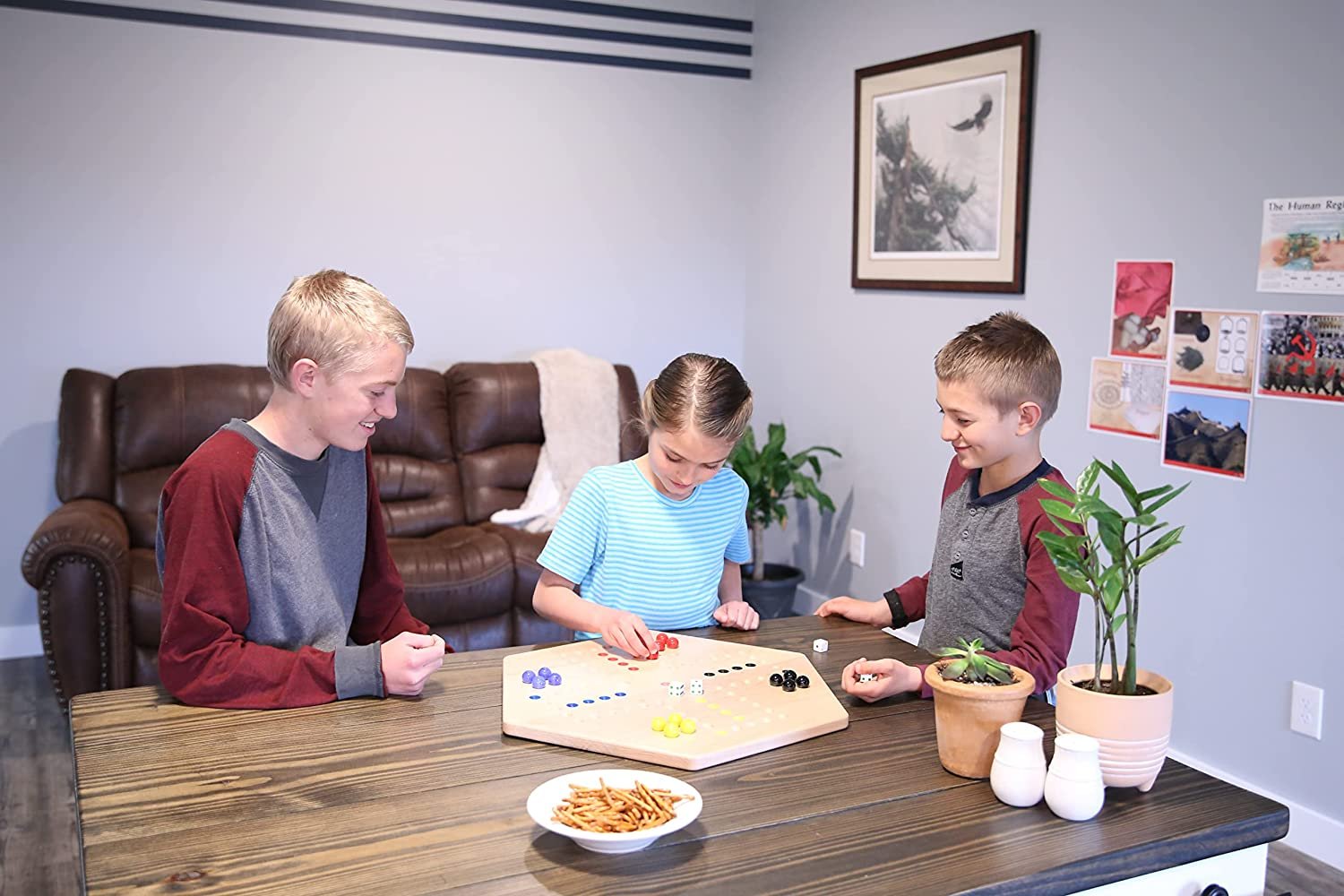 Hand-painted Aggravation Wahoo marble board game by AmishToyBox.com, featuring a double-sided wooden game with colorful marble pathways.