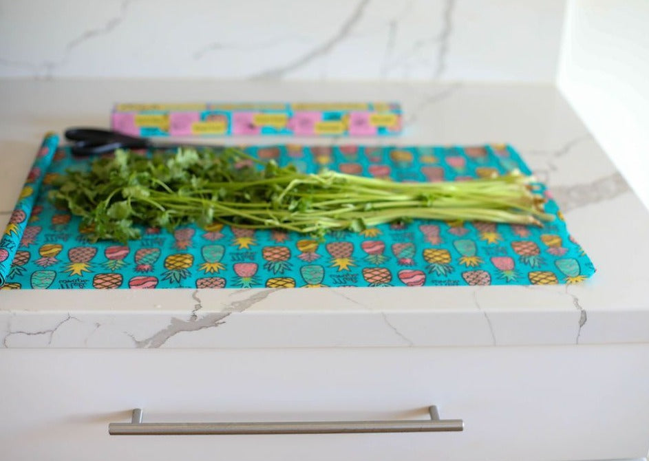 Beeswax Wrap Bulk Roll from Meli Wraps with pineapple print, natural beeswax-coated reusable food wrap roll.