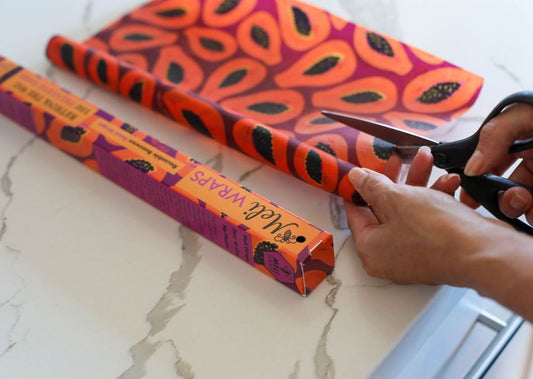 Meli Wraps beeswax roll in purple papaya print, natural beeswax wrap bulk roll for food storage and wrapping.
