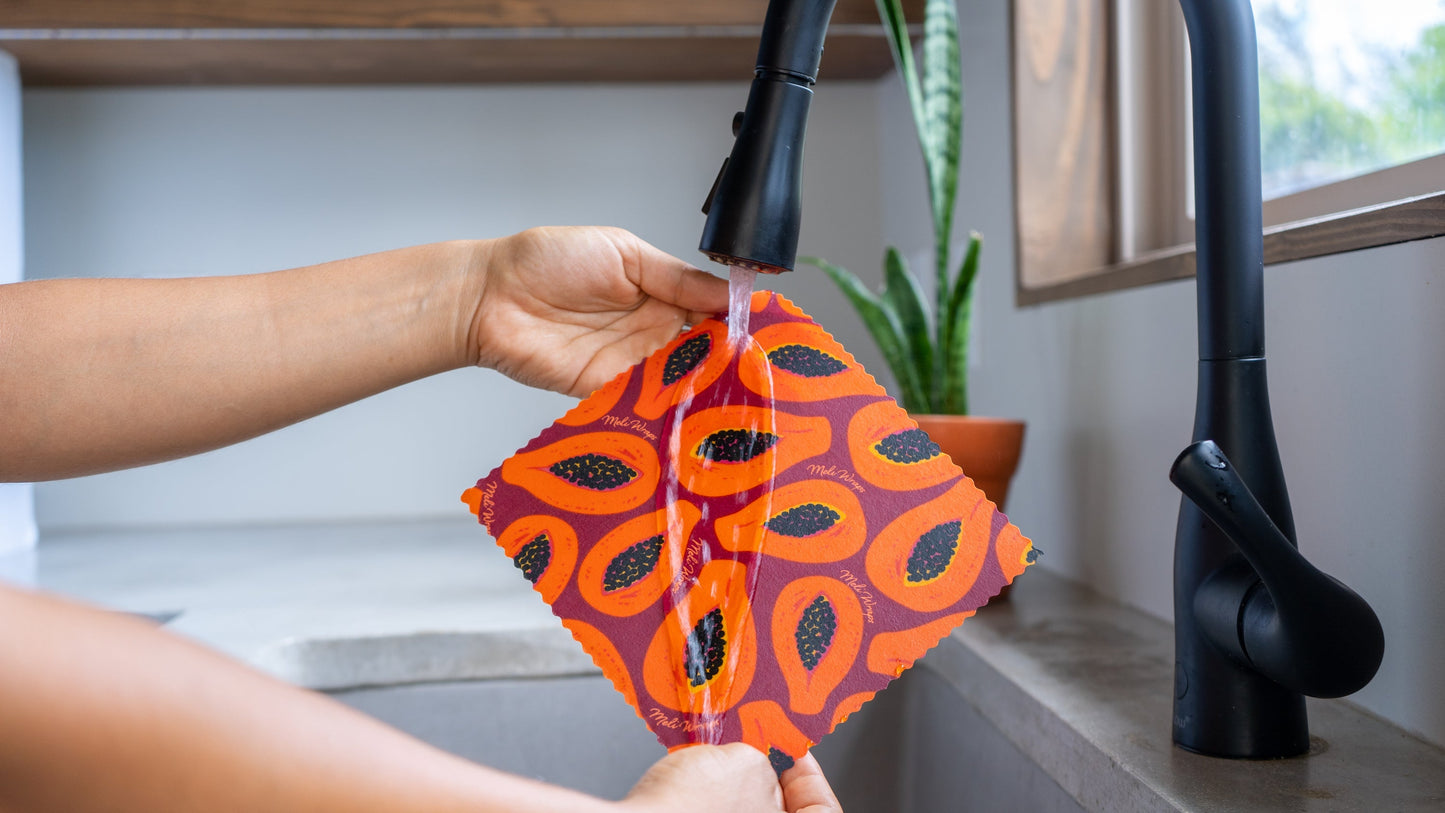 Meli Wraps beeswax roll in purple papaya print, bulk pack of beeswax wraps for food storage, natural and eco-friendly.