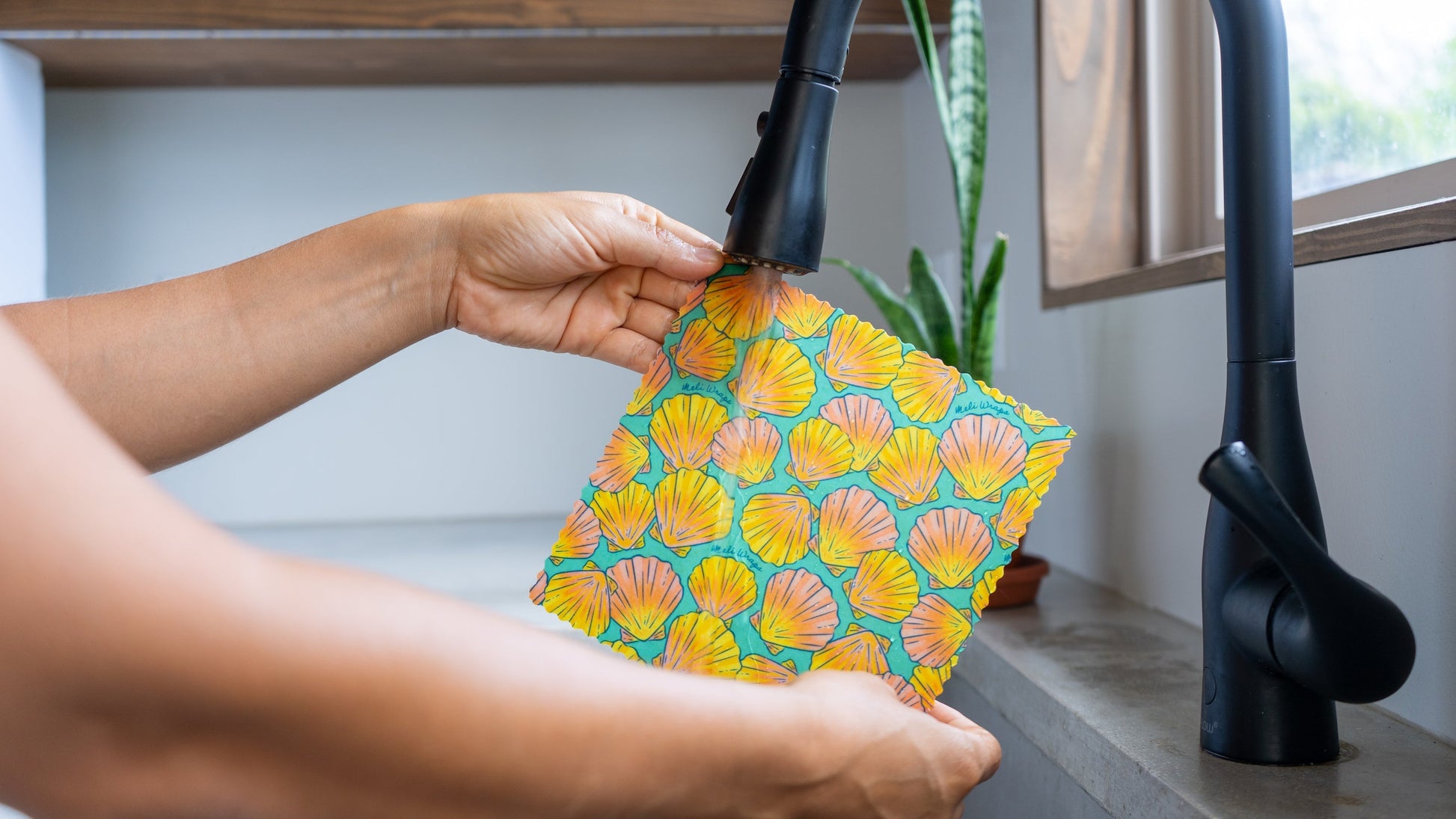 Meli Wraps beeswax wrap bulk roll with shell print, natural beeswax coating, reusable food wrap for eco-friendly storage.