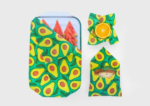 Set of three Meli Wraps beeswax food wraps with avocado print in small, medium, and large sizes for eco-friendly food storage.