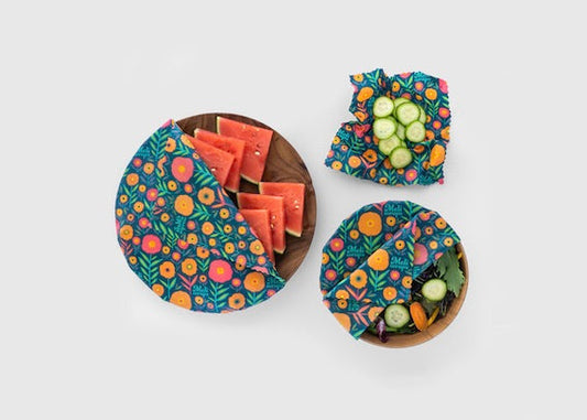 Set of three Meli Wraps beeswax food wraps in fall bloom print, small, medium, and large sizes for food storage and wrapping.