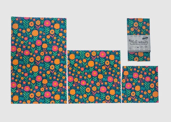 Set of Meli Wraps beeswax food wraps in fall bloom print, including small, medium, and large sizes, for eco-friendly food storage.