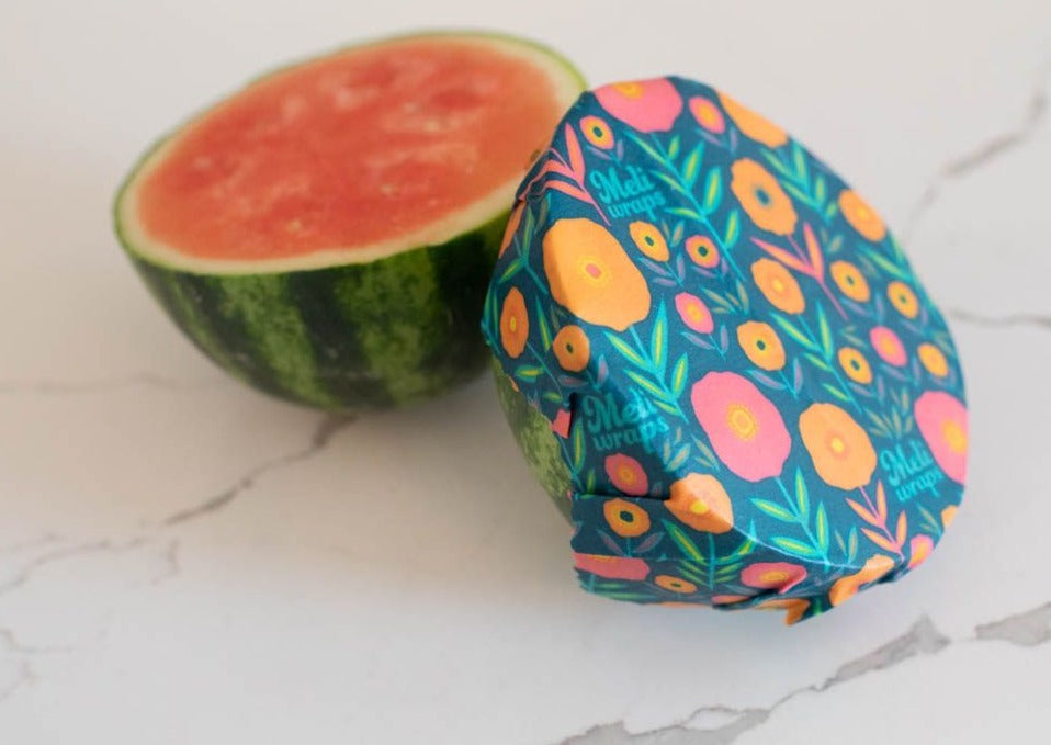Set of Meli Wraps beeswax food wraps in fall bloom print, including small, medium, and large sizes for food storage.