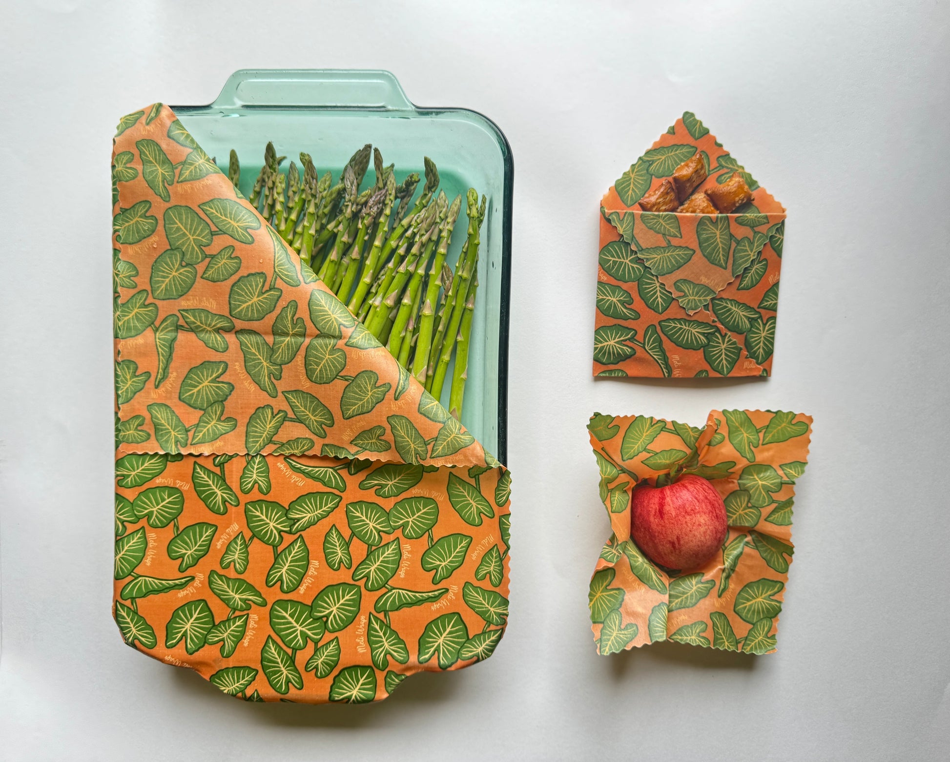 Set of three Meli Wraps beeswax food wraps in small, medium, and large with Kalo print, eco-friendly beeswax wraps for food storage.