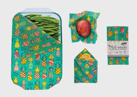 Set of Meli Wraps beeswax food wraps with pineapple print in small, medium, and large sizes for eco-friendly food storage.
