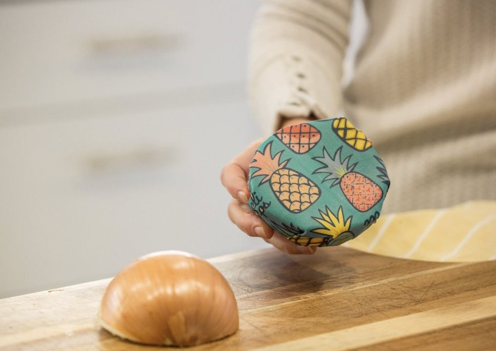 Meli Wraps beeswax food wraps with pineapple print in small, medium, and large sizes for eco-friendly food storage.