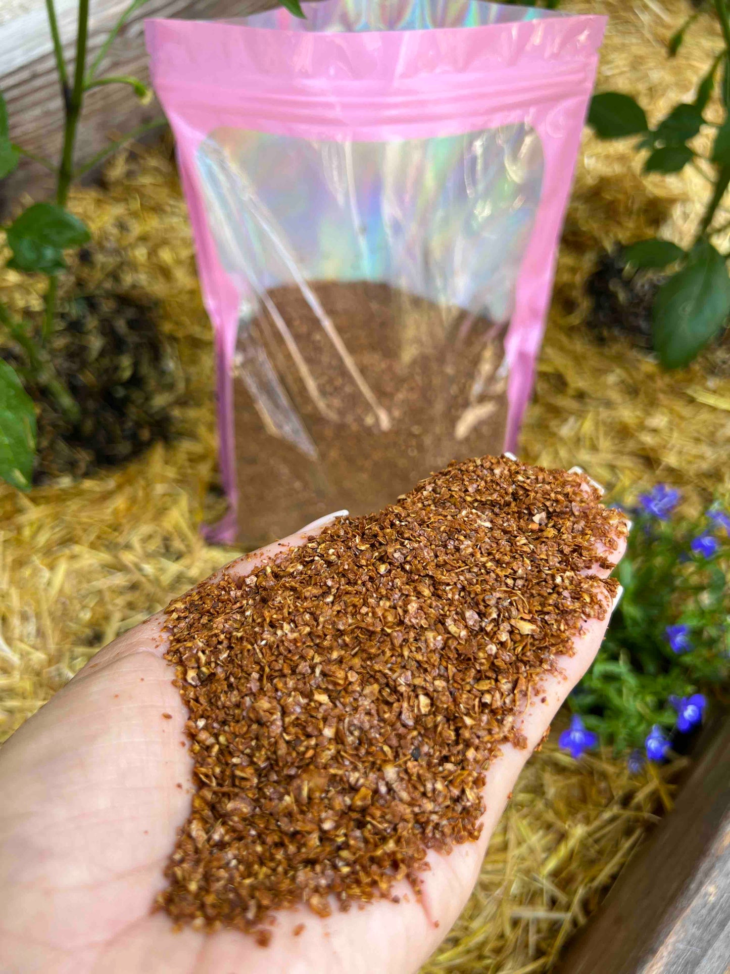 One-pound supply of Meme's Worms microbial compost food in a bag, designed to enrich soil with beneficial microbes.