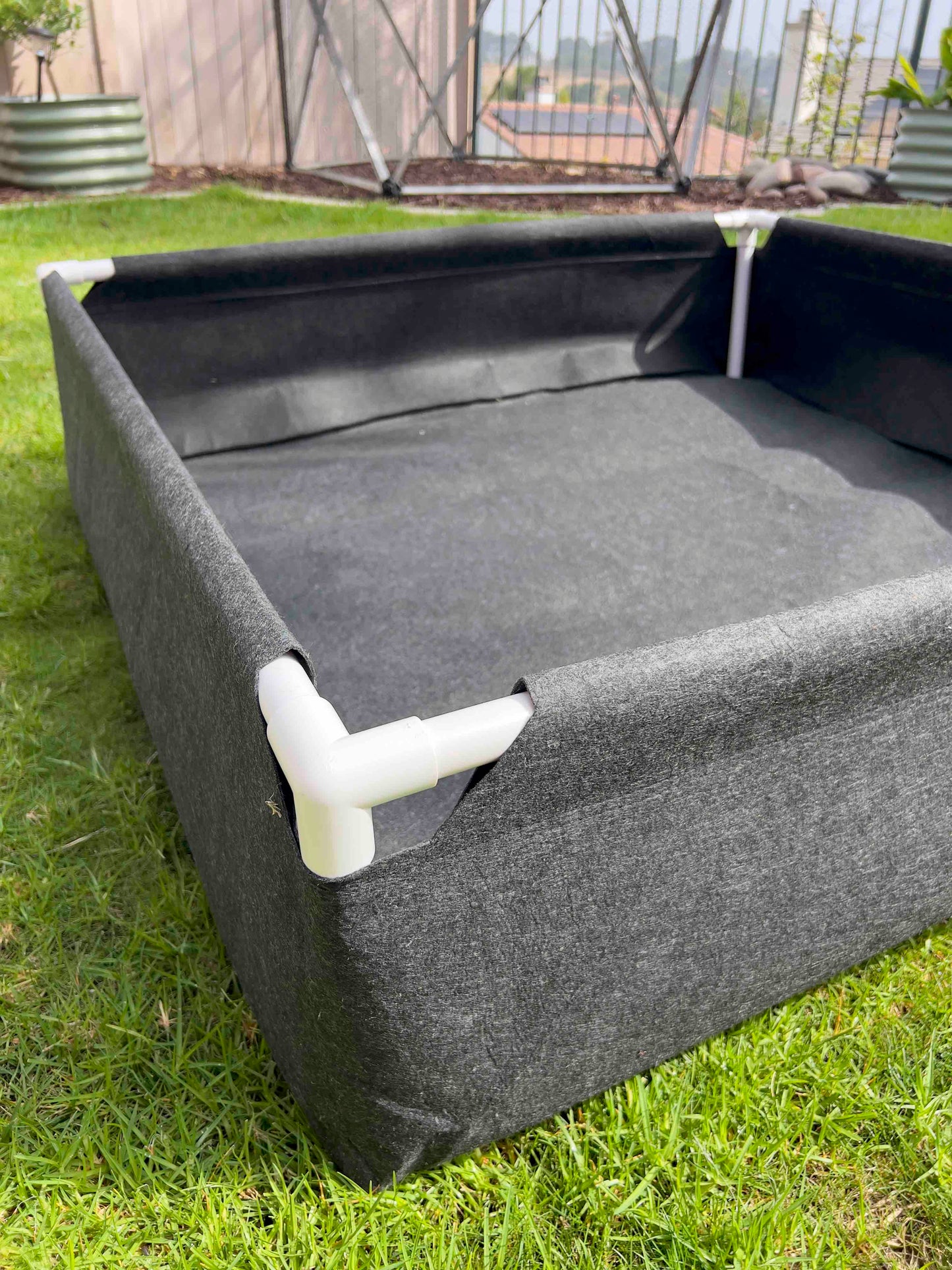 Fabric raised worm farm worm bin by Meme's Worms, small fabric worm bin for composting and vermiculture, dimensions 48x16x12 inches.