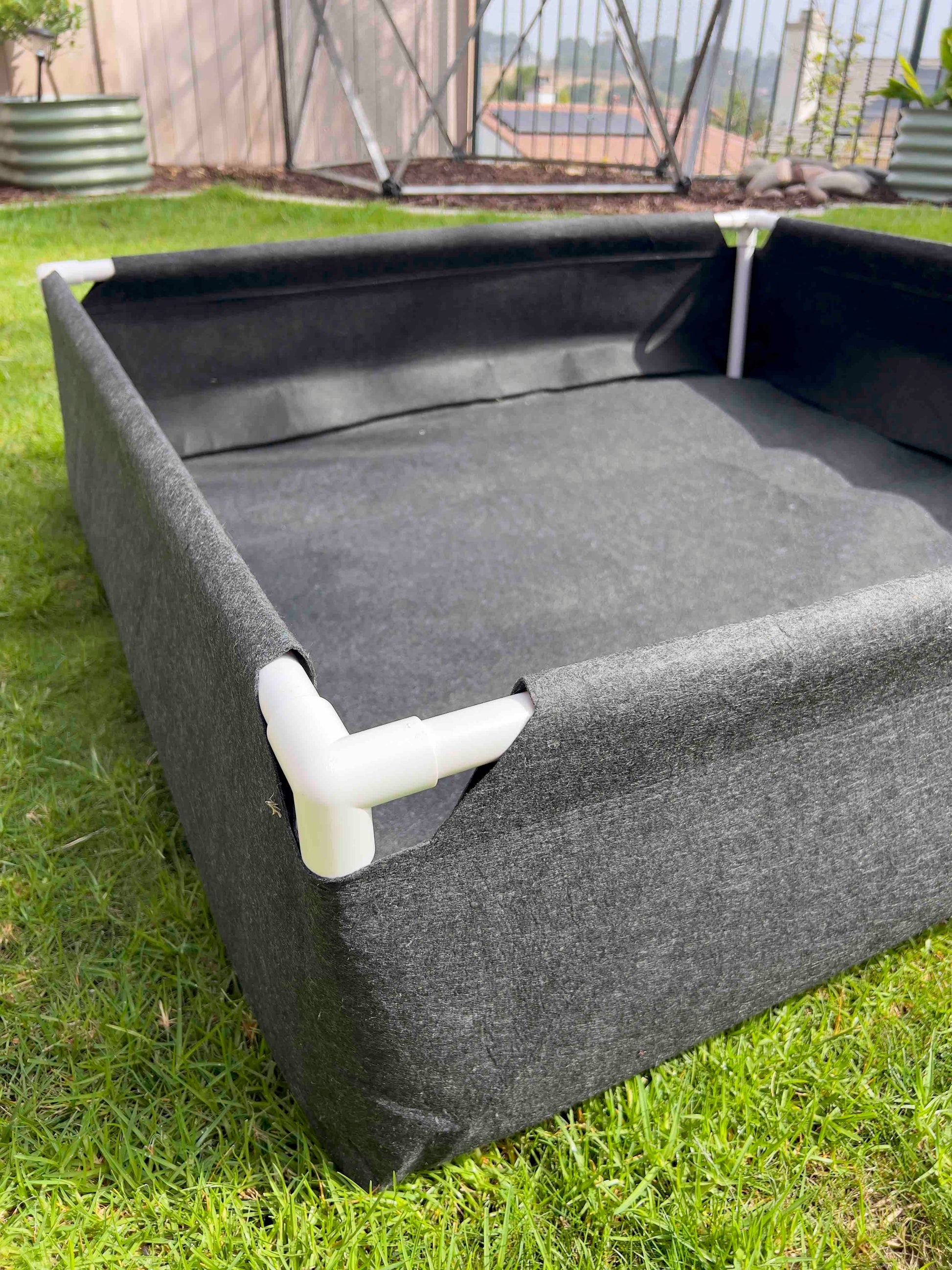 Fabric raised worm farm worm bin by Meme's Worms, small fabric worm bin for composting and vermiculture, dimensions 48x16x12 inches.