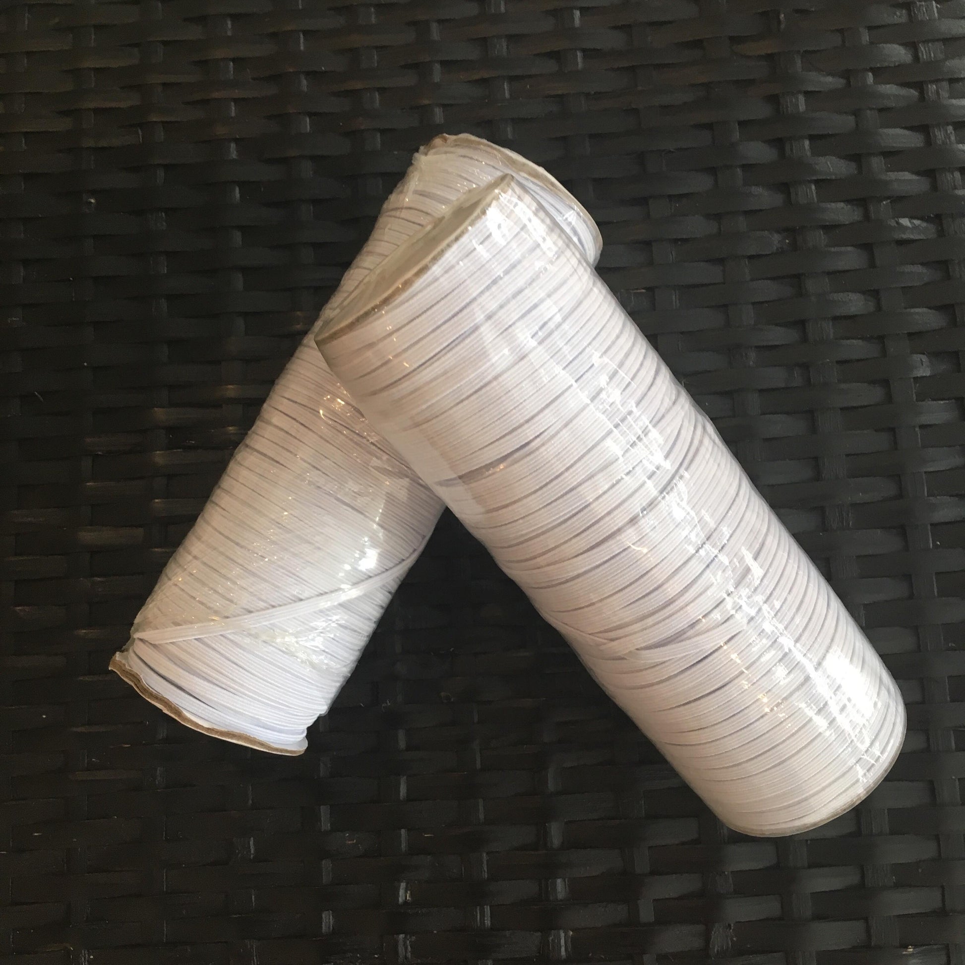 Elastic tomato string spool by MIgardener, 100 yards, used for supporting tomato plants in gardening.
