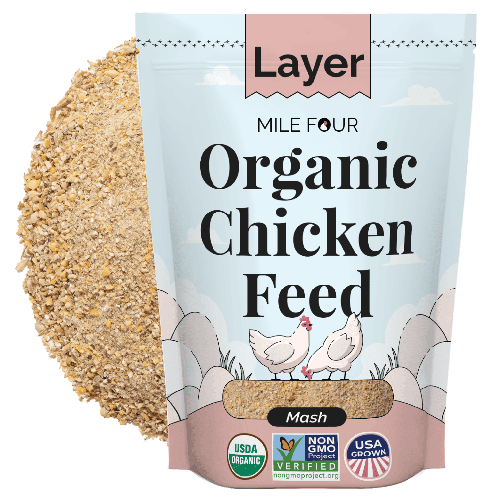 Organic chicken feed pellets by Mile Four, 2 lbs, designed for laying hens, shown in a close-up image.