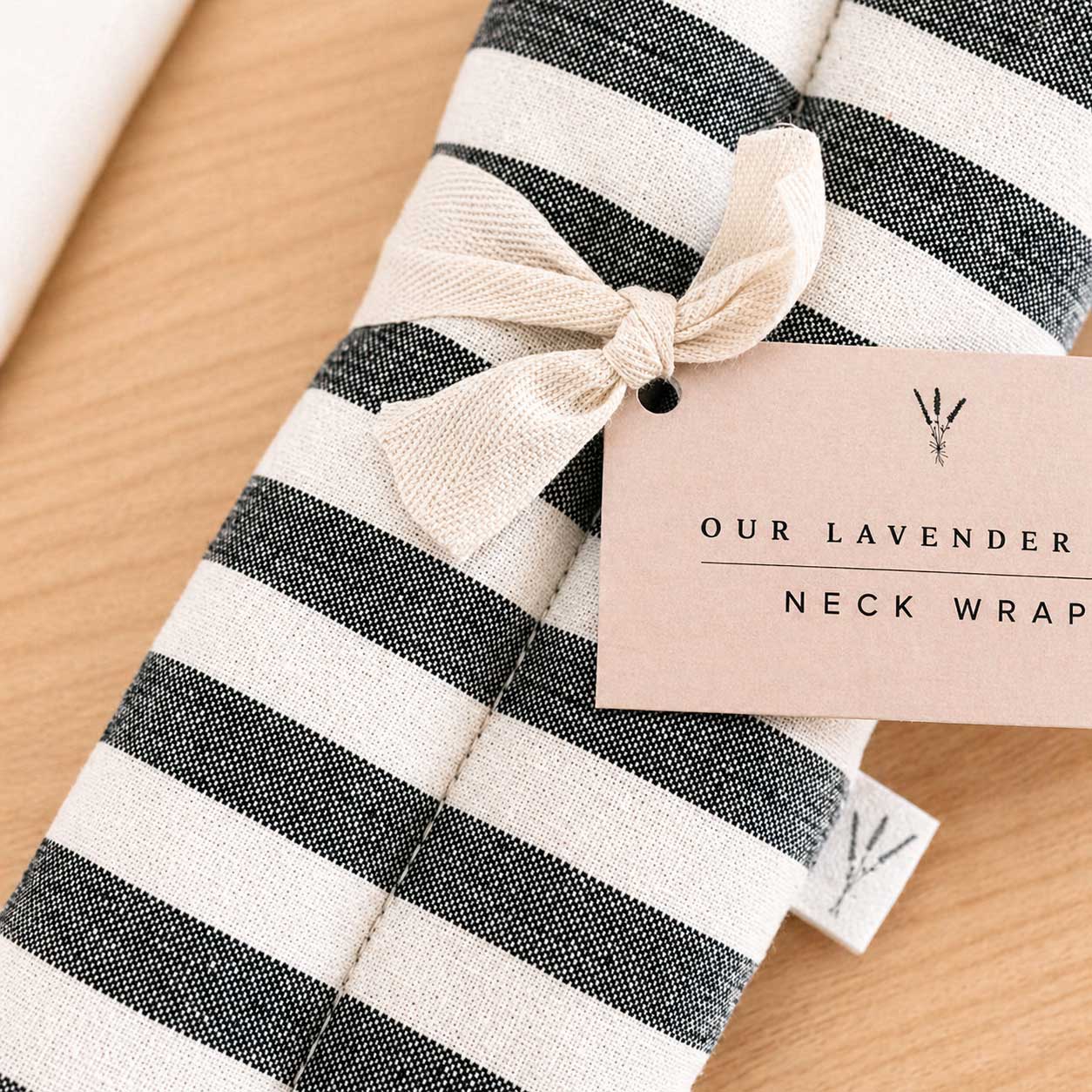 Lavender neck wrap heating pad by Our Lavender Co, 28x4 inches, soft fabric for soothing heat therapy and relaxation.