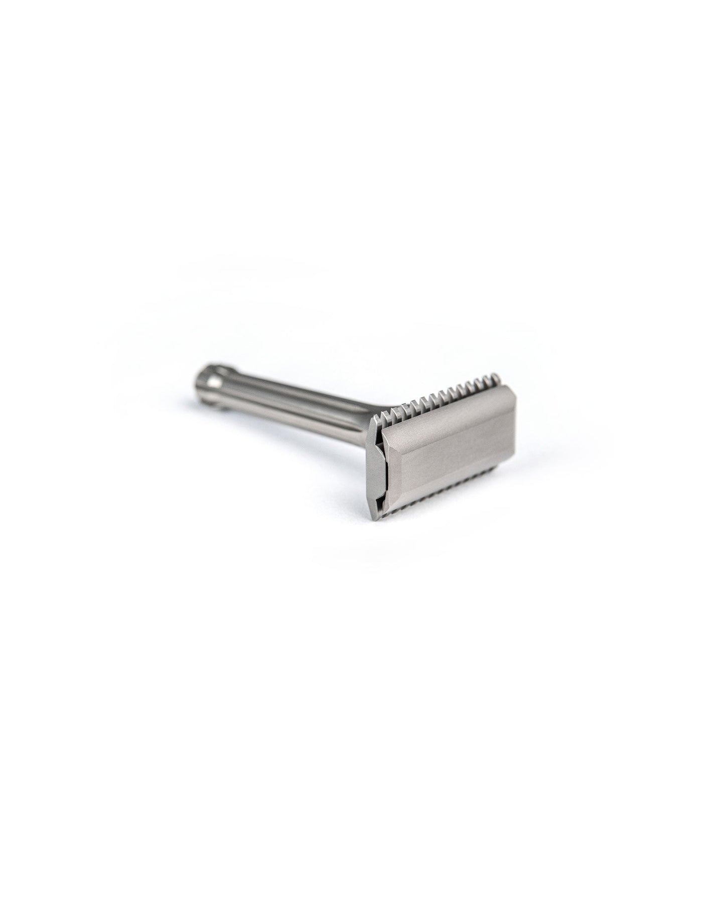 Blackbird Titanium razor by Blackland Razors with sleek black finish and modern design, displayed on a clean background.