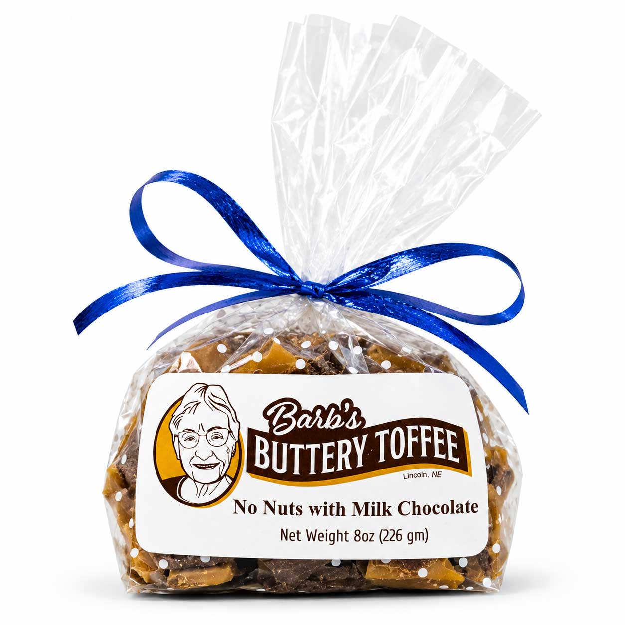 Homemade milk chocolate toffee with nuts on a plate, showcasing buttery toffee from Barb's for a sweet treat.