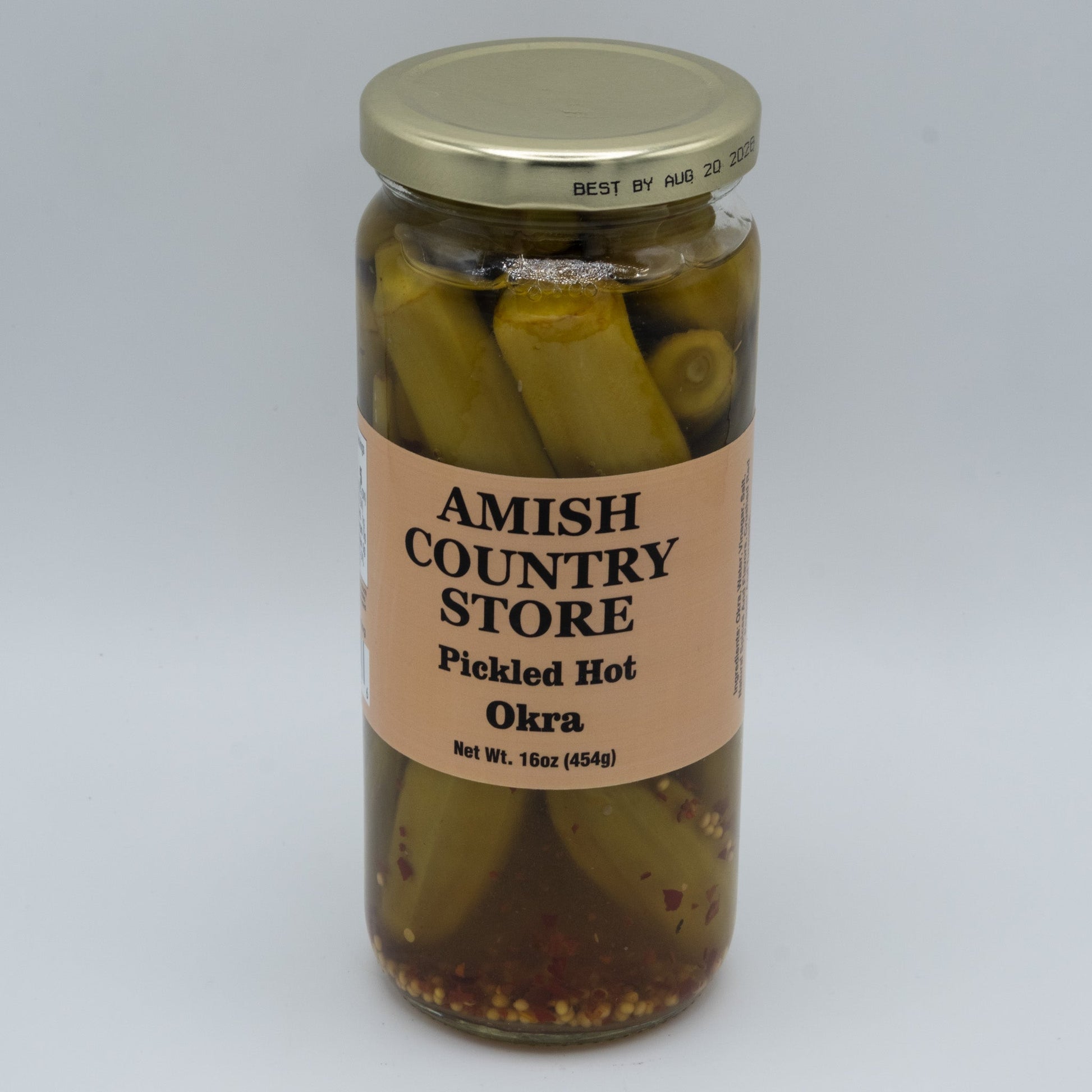 Jar of Amish Country Store pickled hot okra in a 16oz glass jar, showcasing vibrant green okra spears in brine.