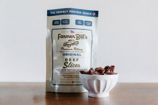 Sliced 1/2 lb Original Beef Biltong from Farmer Bill's Provisions, showing thin, flavorful beef slices in a clear bundle.