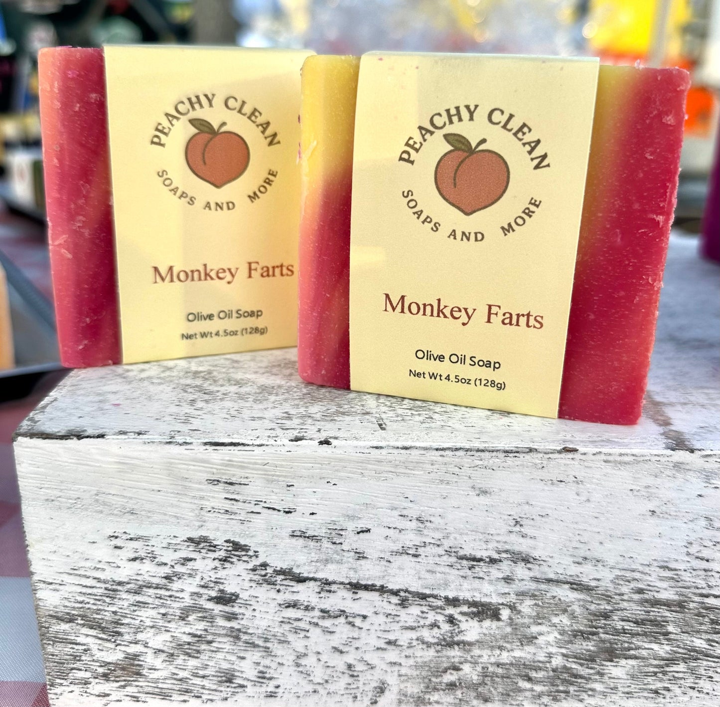 Handmade soap bar labeled Monkey Farts by Peachy Clean Soaps and More LLC, featuring colorful, playful packaging with vibrant designs.