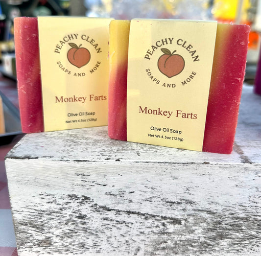 Handmade soap bar labeled Monkey Farts by Peachy Clean Soaps and More LLC, featuring colorful, playful packaging with vibrant designs.