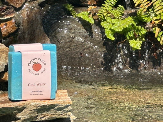 Bar of Cool Water soap by Peachy Clean Soaps and More LLC with a smooth, clean design and fresh scent packaging.