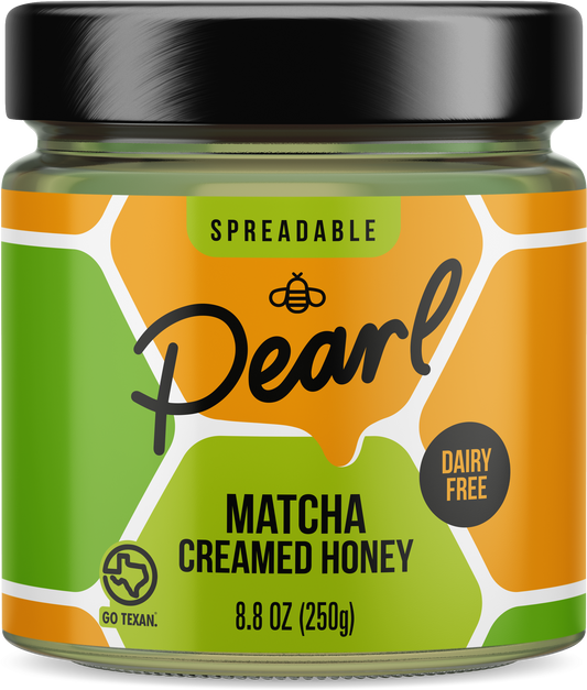 Jar of Pearl Honey Spreads Matcha Creamed Honey with vibrant green matcha flavor and smooth honey texture.