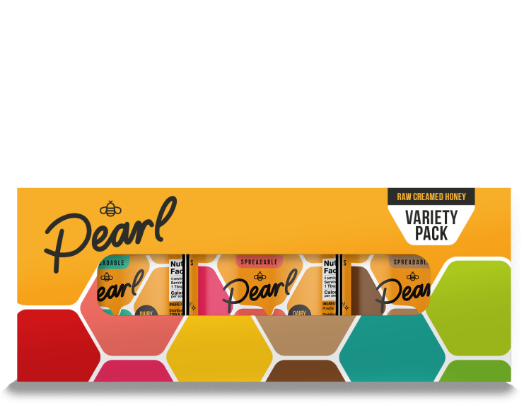 Pearl Honey Spreads Variety 3 Pack featuring different flavored jars on a spice rack shelf.
