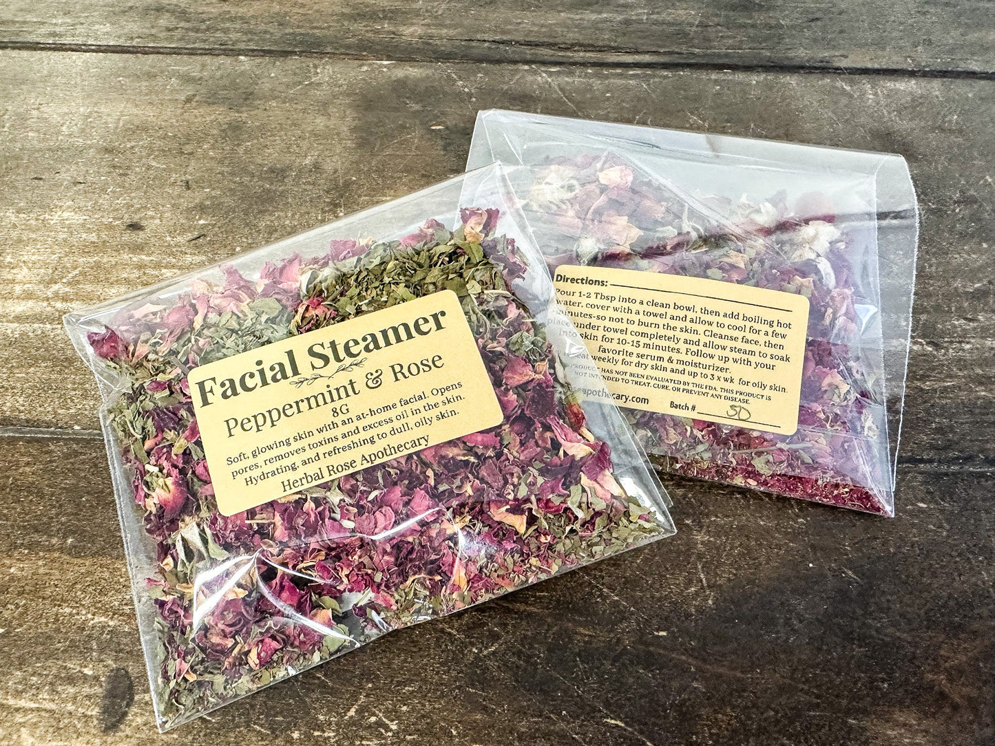 Herbalroseapothecary peppermint rose facial steamer showing a sleek device with rose and peppermint scent elements.